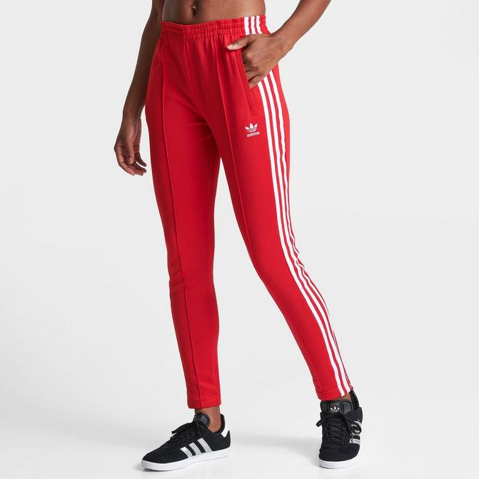 Adidas sst track pants womens red best sale