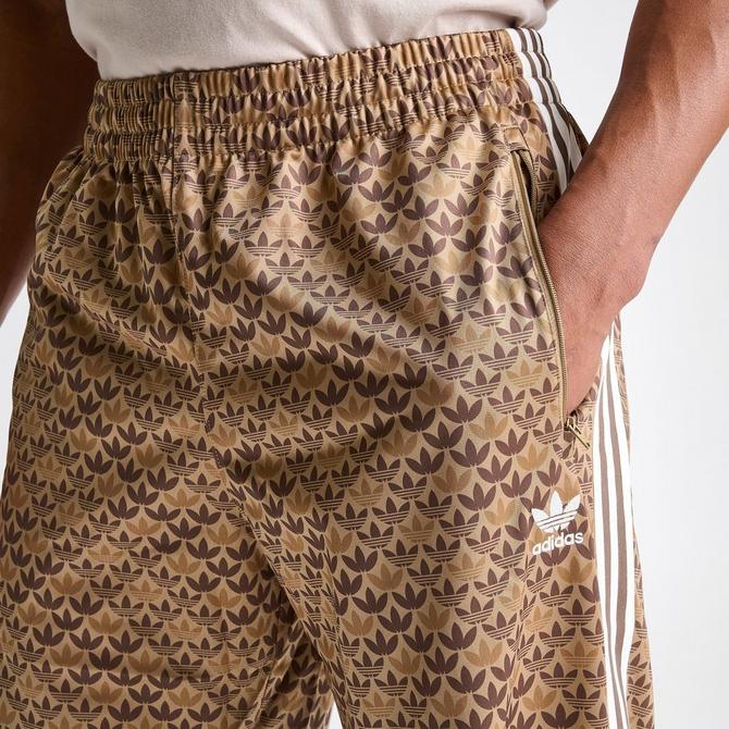 adidas Originals Retro Luxury track pants in brown with monogram print