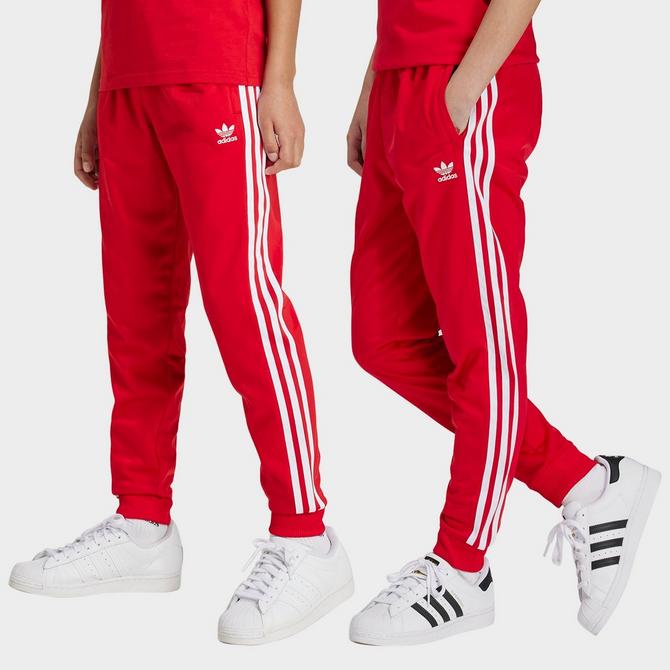 Adidas track pants cuffed online