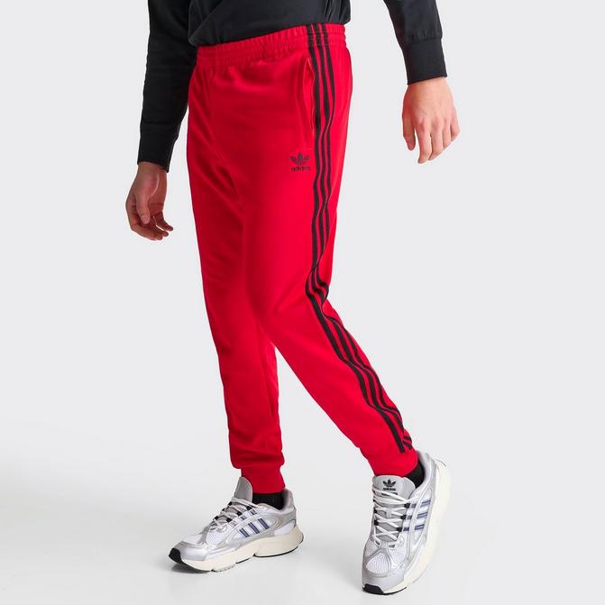 adidas Originals ADICOLOR HERITAGE NOW STRIPED TRACKSUIT BOTTOMS Red