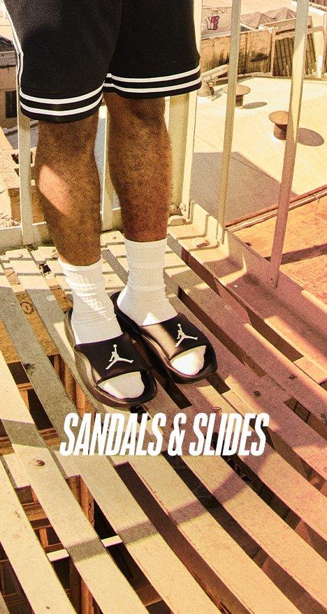 Sandals and slides featuring a jordan slide