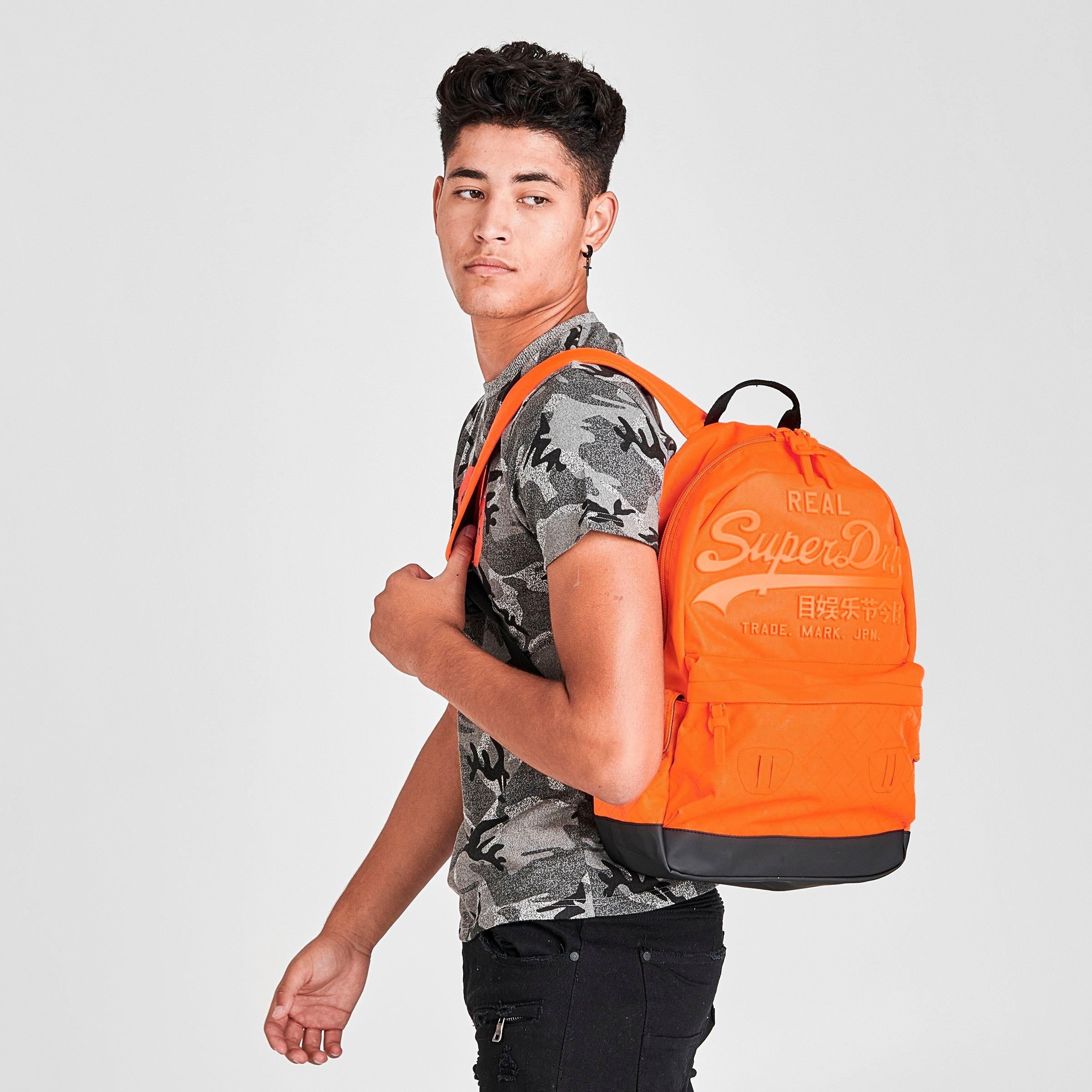 orange superdry backpack