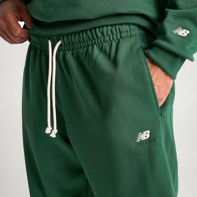 Shop New Balance 90s Athletic Sweatpants MP31503-NWG green