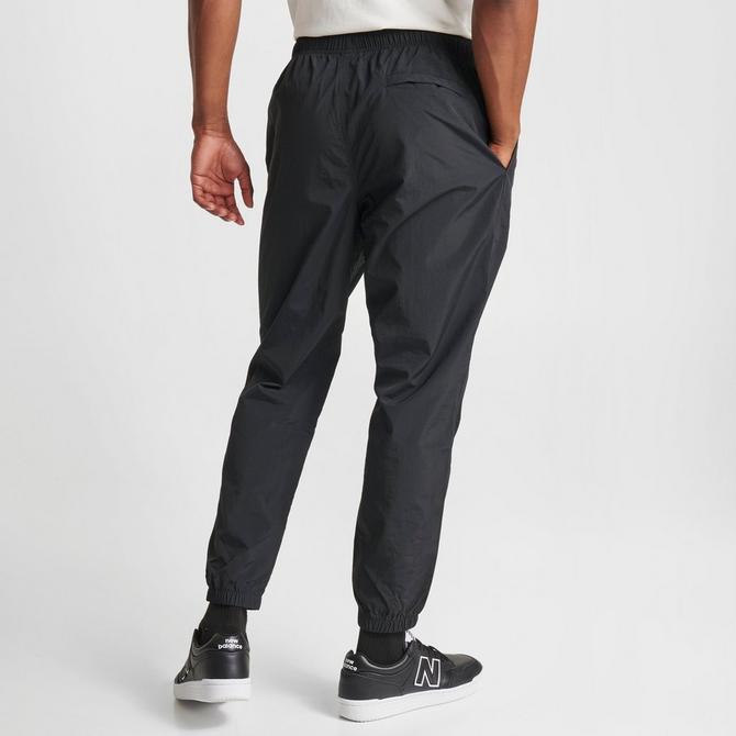 Men's New Balance Sport Essentials Premium Woven Windbreaker Pants