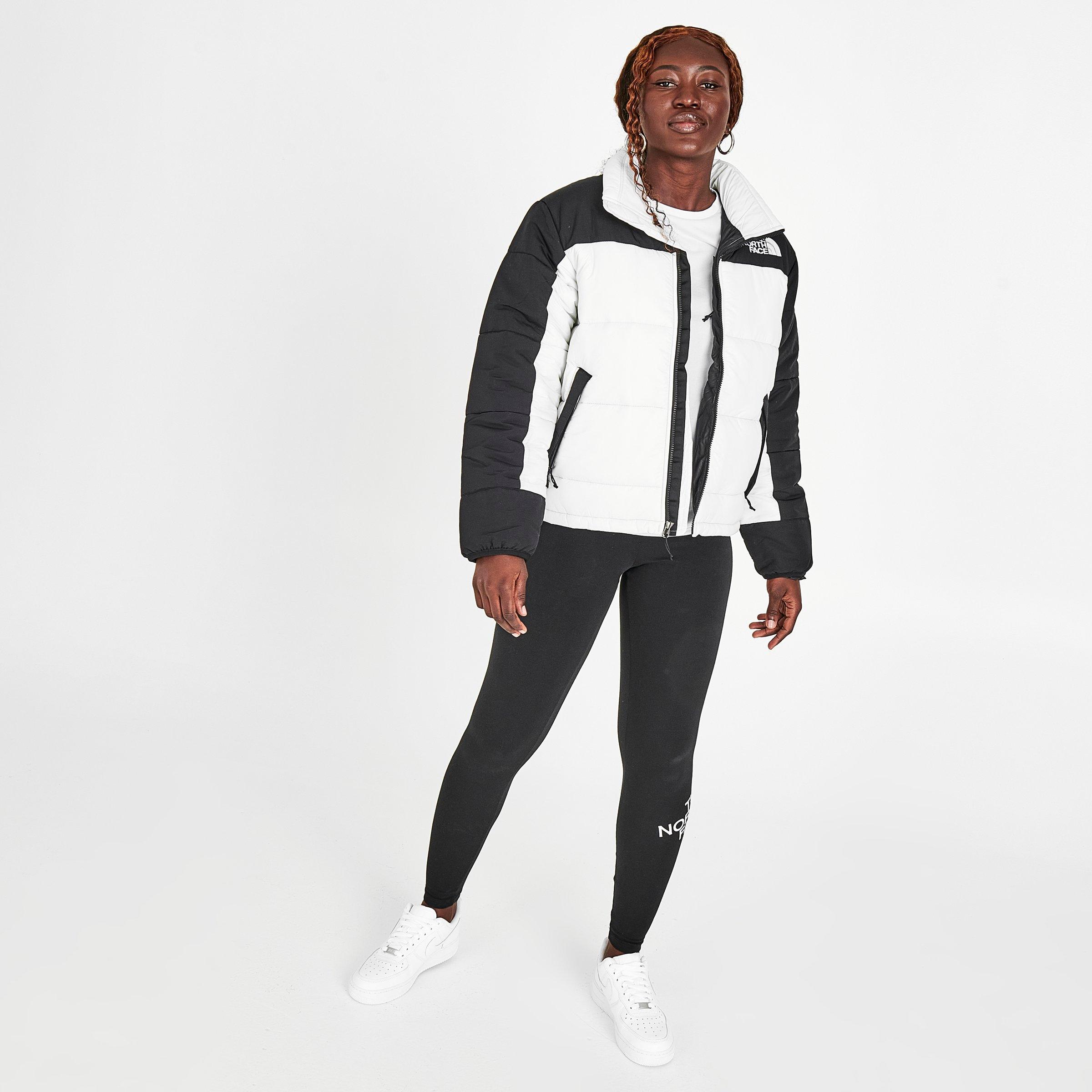 white and black north face coat