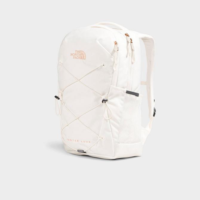 The North Face Women s Jester Luxe Backpack Gardenia White Burnt Coral Metallic