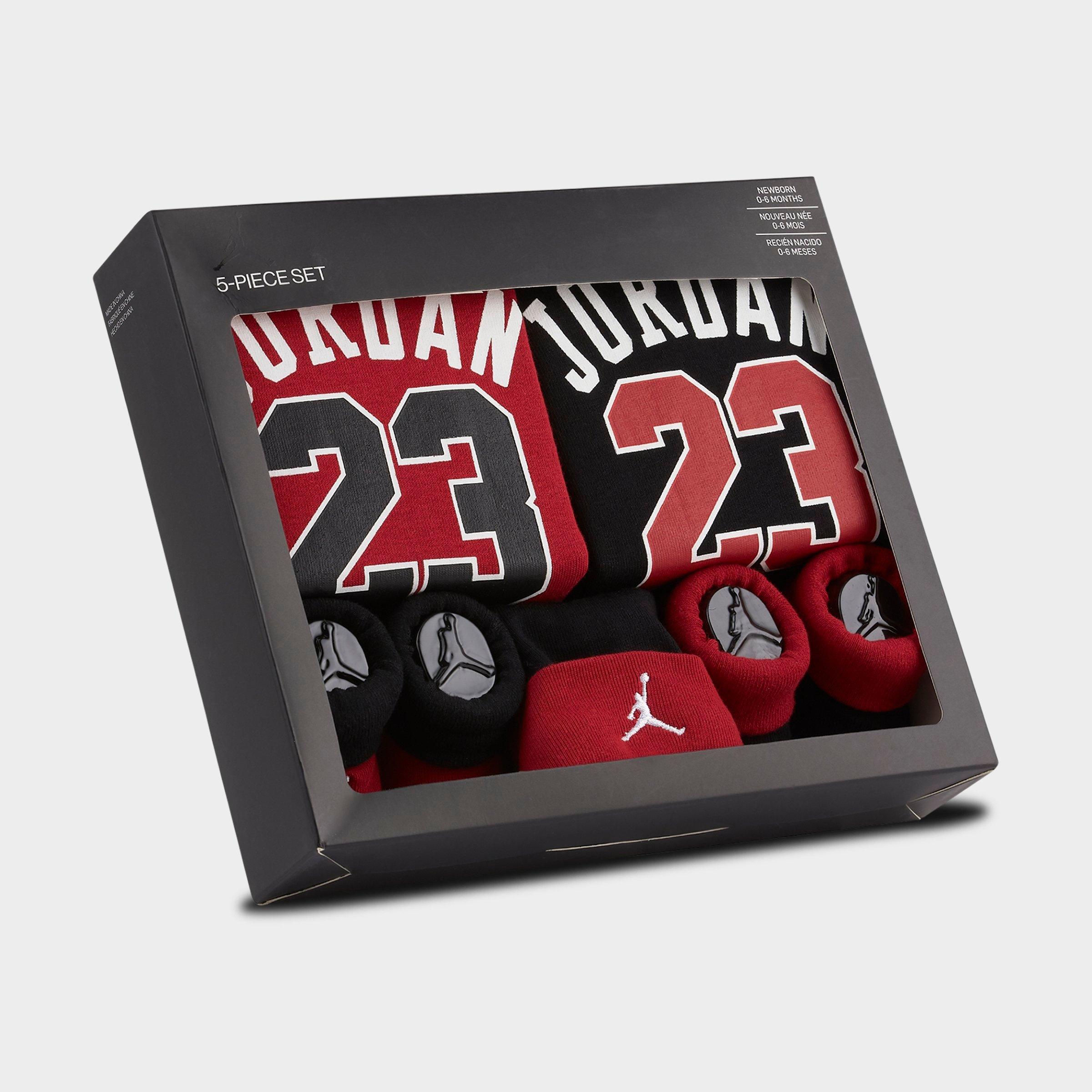 red and black infant jordans