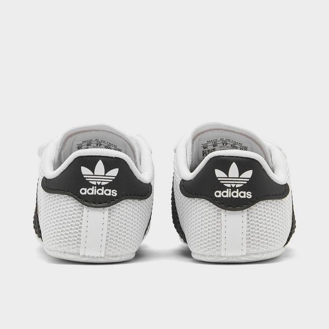 Black adidas crib outlet shoes