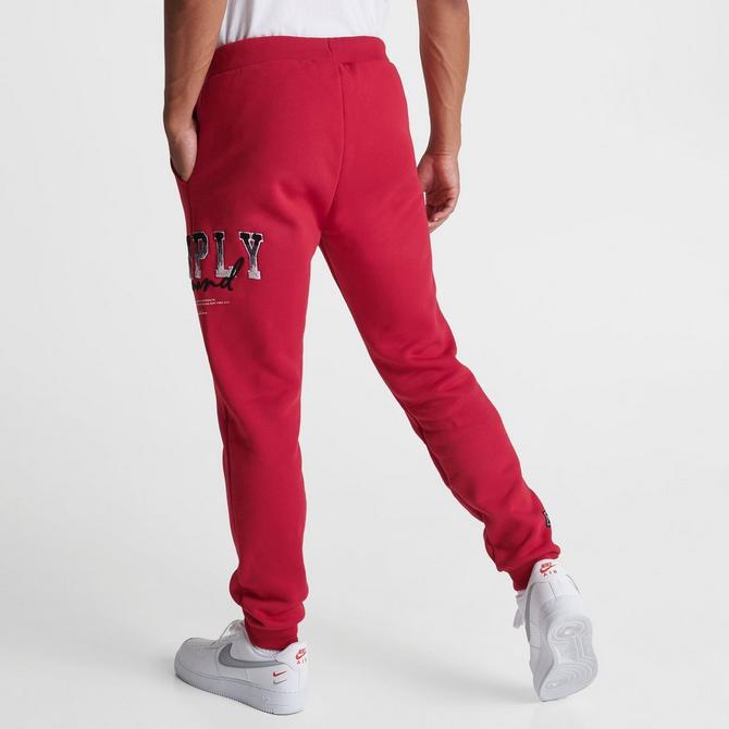 HERMAN&CO UNISEX TAPERED JOGGERS - Tracksuit bottoms - dark red 