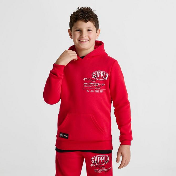 Red supply and demand tracksuit sales