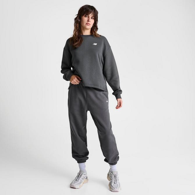 Buy New Balance women sportswear fit training sweatpants dark grey