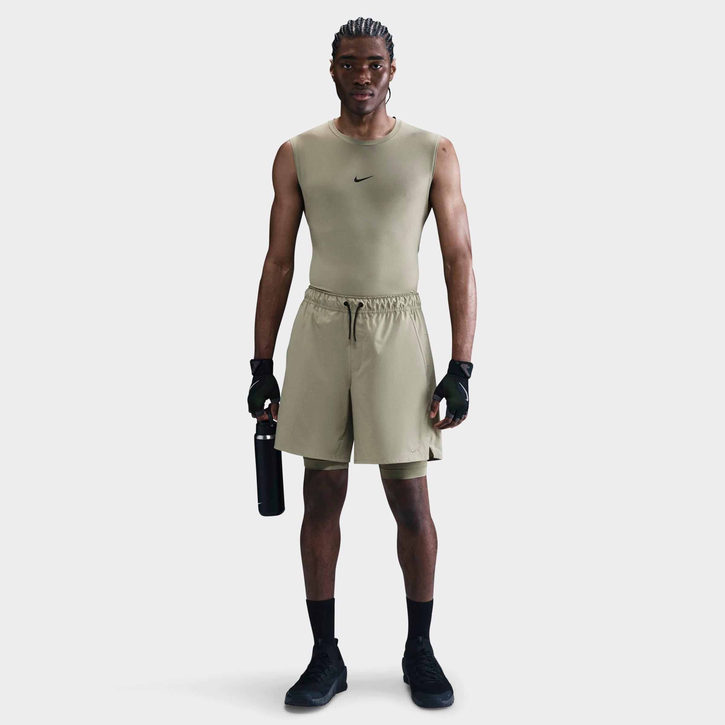 Nike Men's Unlimited Dri-FIT 2-in-1 7" Versatile Shorts in Light Army/Light Army/Black Size: Small