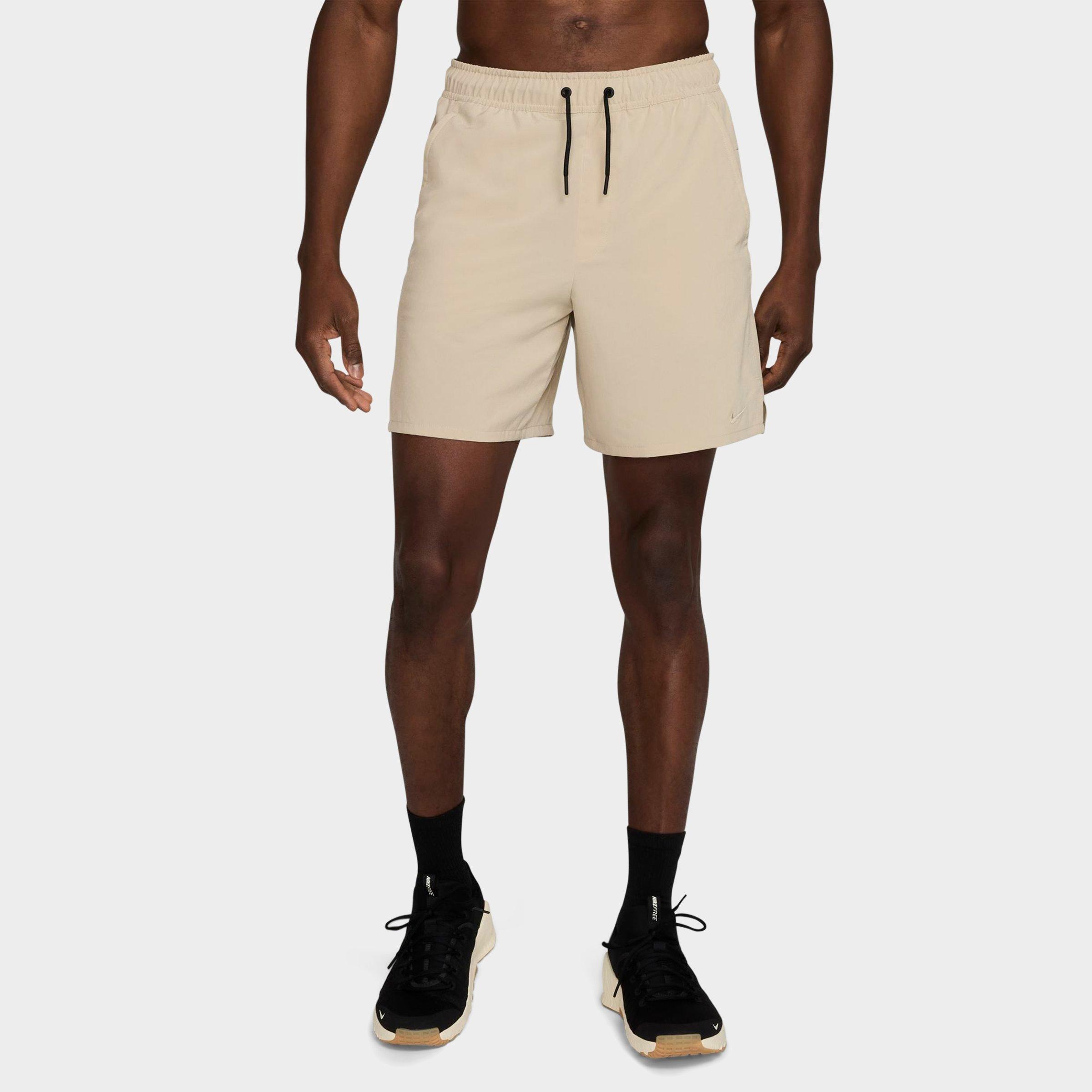 Nike Men's Unlimited Dri-FIT 7" Unlined Versatile Shorts in Desert Khaki/Black/Desert Khaki Size: Small