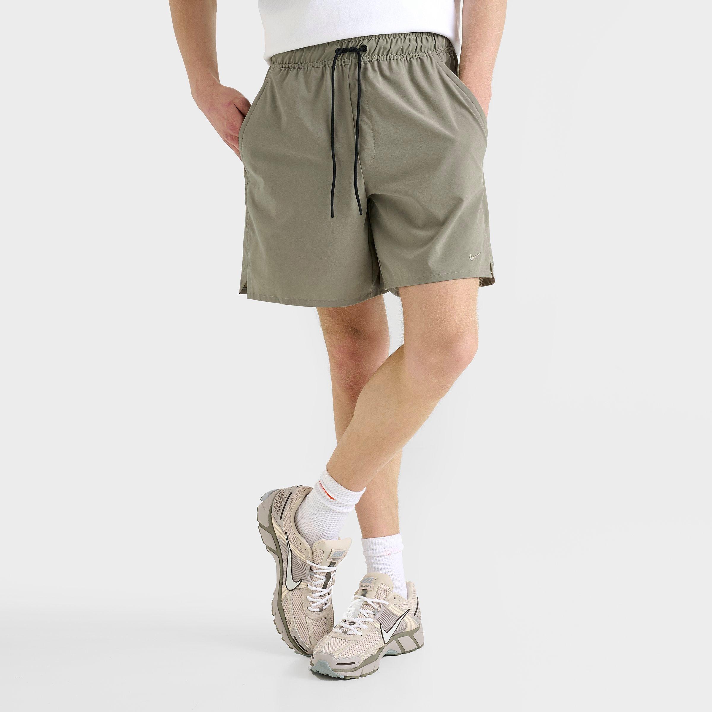 Nike Men's Unlimited Dri-FIT 7" Unlined Versatile Shorts in Light Army/Black/Light Army Size: Small