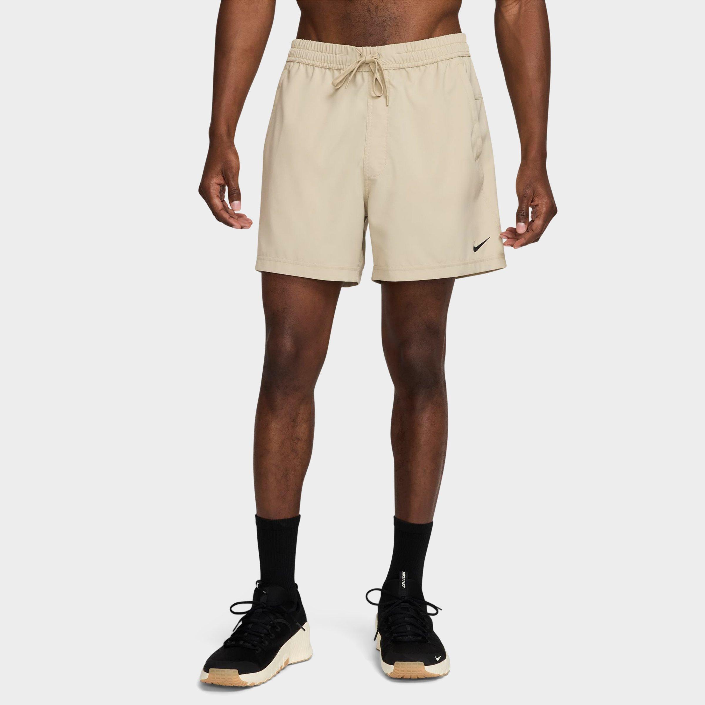 Nike Men's Form Dri-FIT Unlined 5" Versatile Shorts in Desert Khaki/Black Size: Small