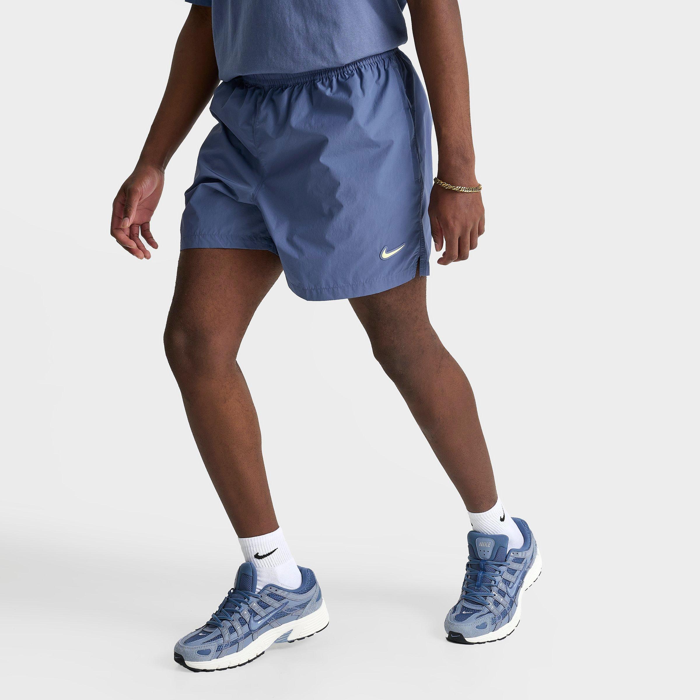 Nike Men's NOCTA Cardinal Nylon Shorts in Diffused Blue/Black/Citron Tint Size: Small