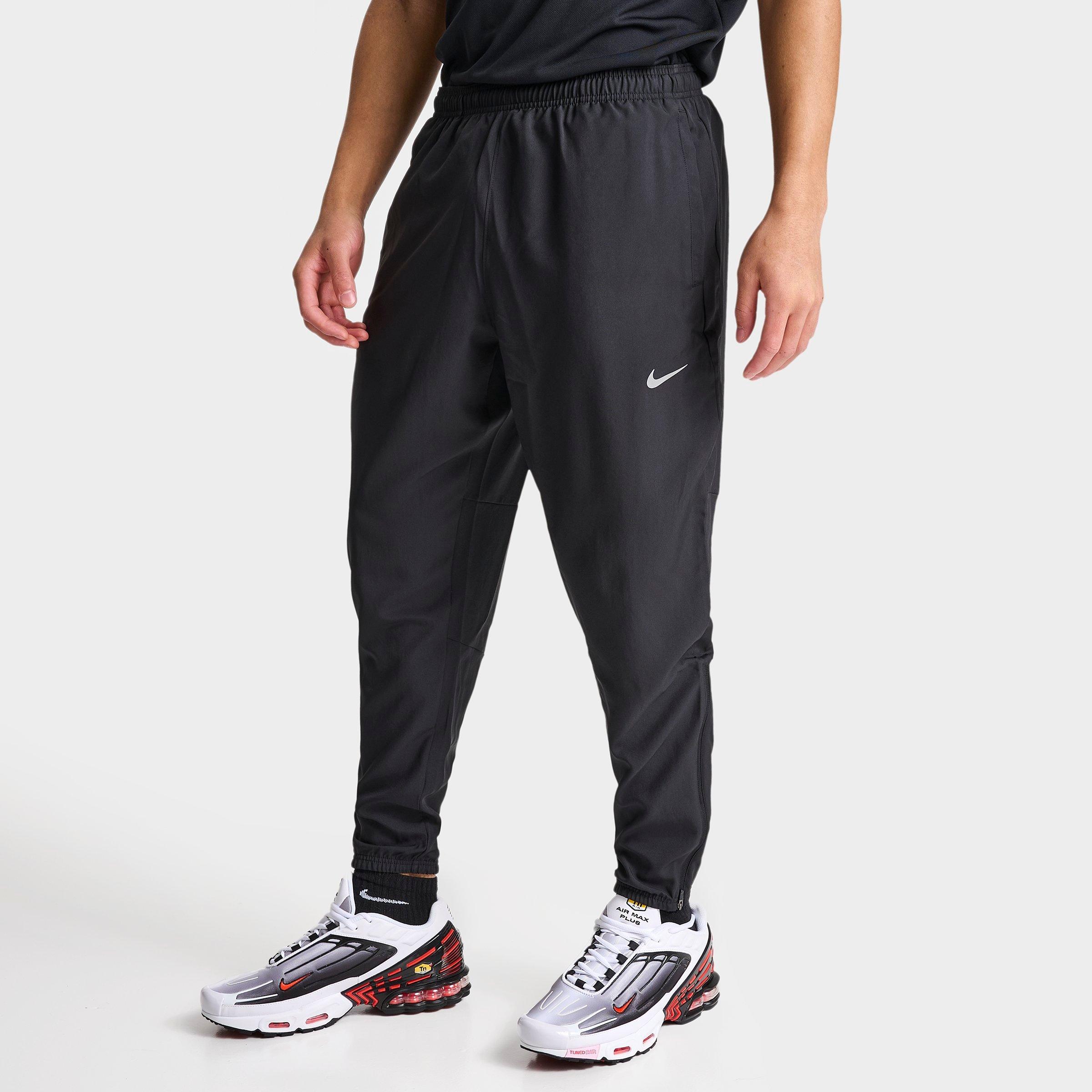 Nike Men's Challenger Dri-FIT Woven Running Pants in Black/Reflective Silver Size: Small