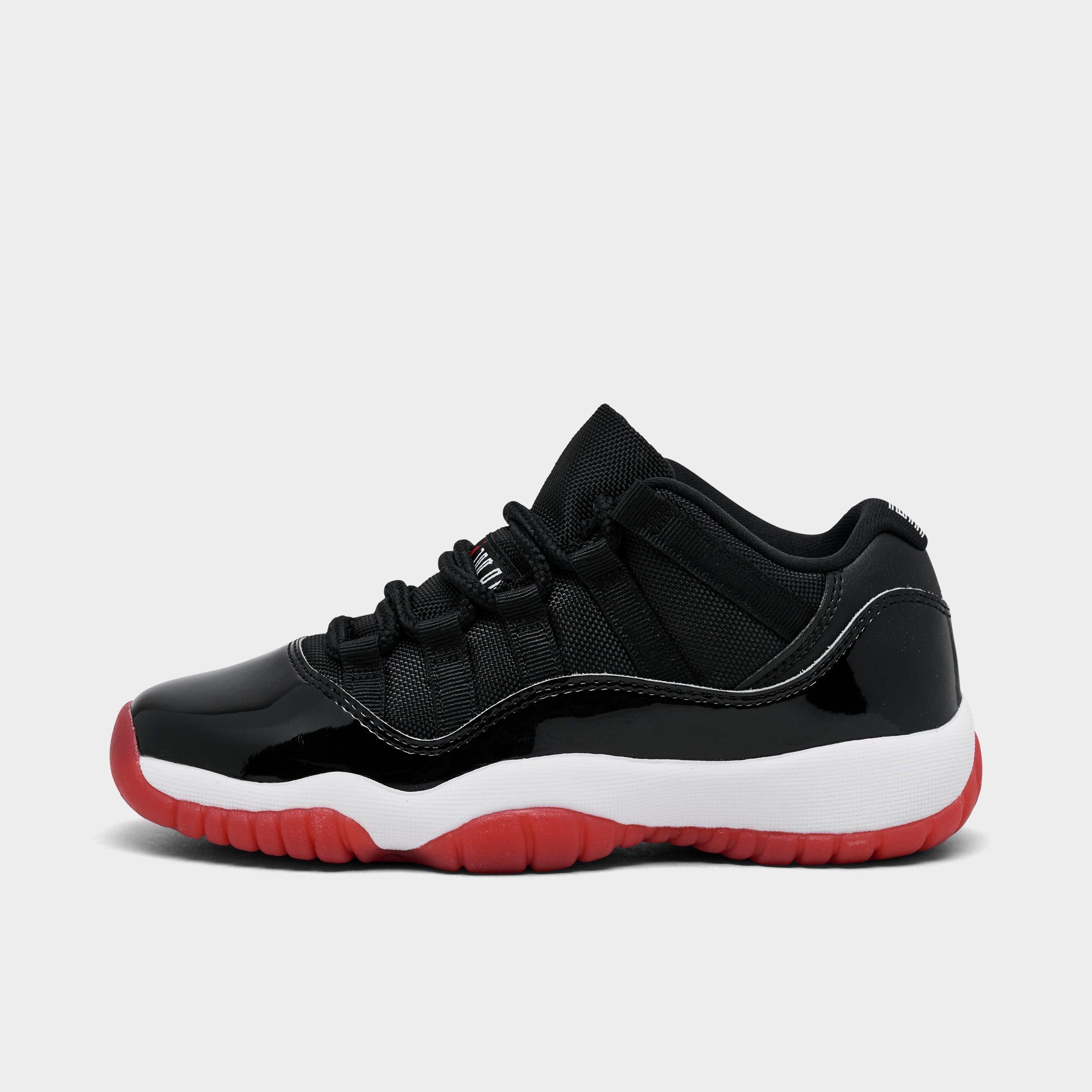 Jordan Big Kids Air Retro 11 Low Basketball Shoes in Black/White/Varsity Red Size: 4.5