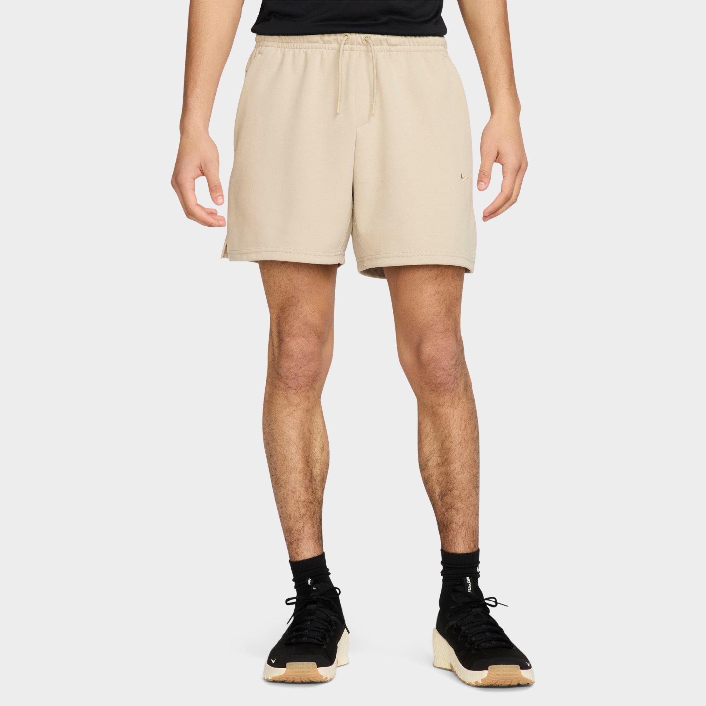 Nike Men's Primary Dri-FIT UV Unlined 7" Versatile Shorts in Desert Khaki/Desert Khaki Size: Small