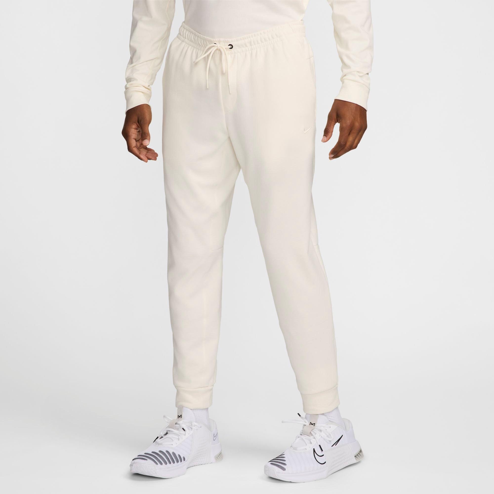 Nike Men's Primary Dri-FIT UV Versatile Jogger Pants in Pale Ivory Size: Small
