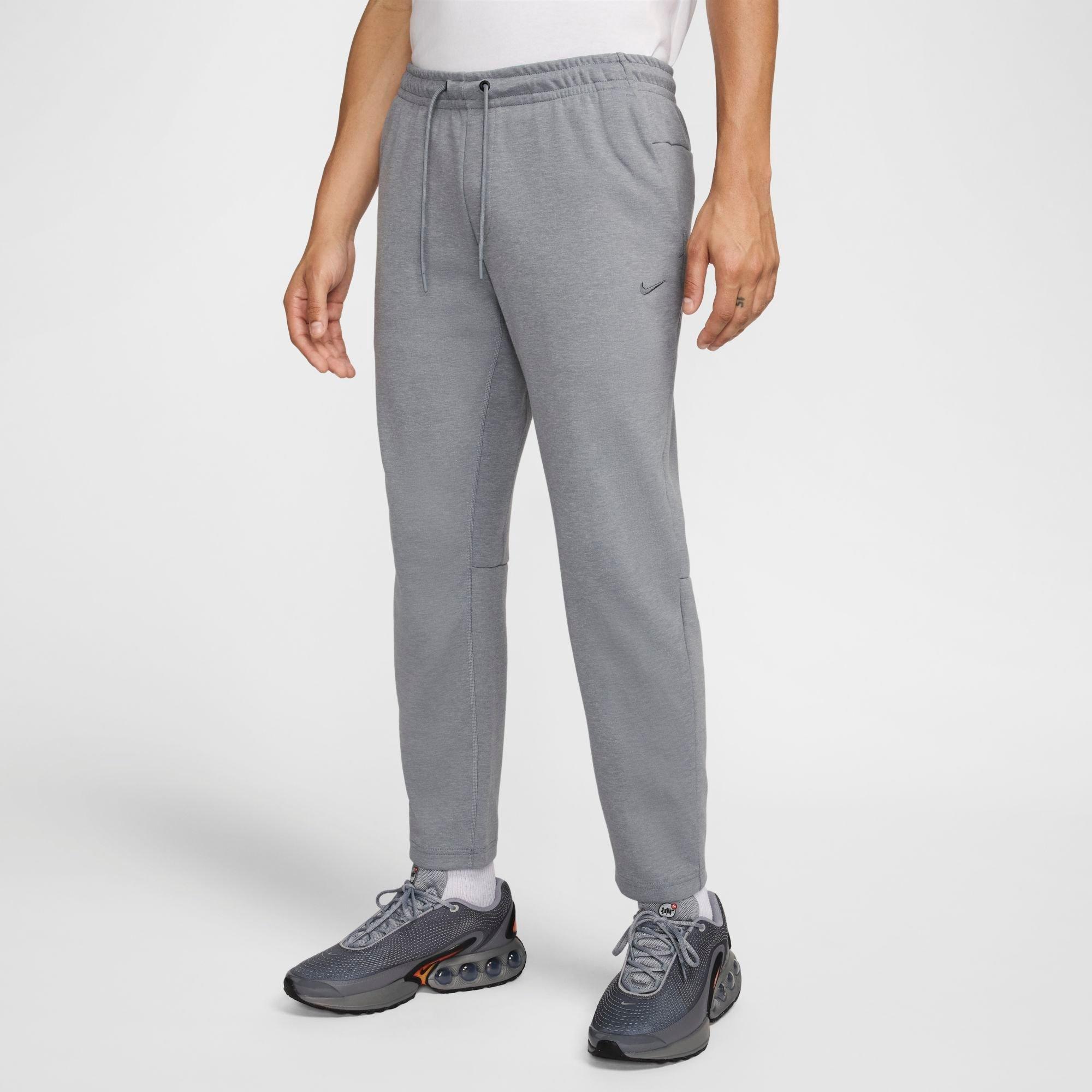 Nike Men's Primary Dri-FIT UV Tapered Versatile Pants in COOL GREY/HTR/(COOL Size: XS