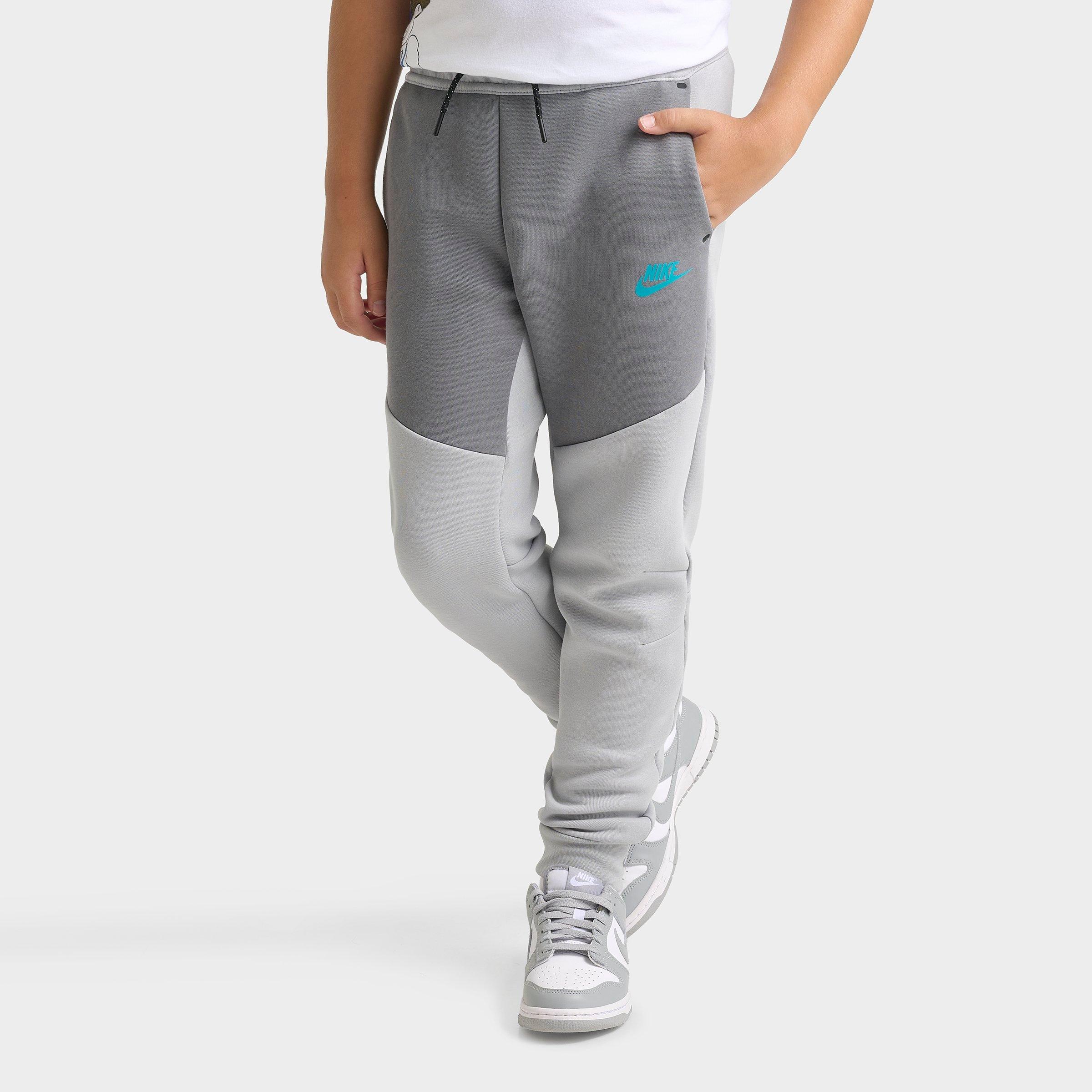 Nike Big Kids Sportswear Tech Fleece Reflective Jogger Pants in Wolf Grey/Smoke Grey/Black Size: Medium