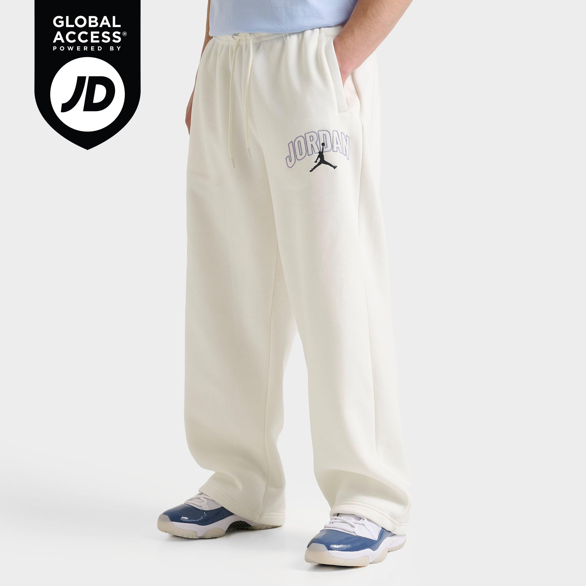 Jordan Men's Brooklyn Fleece Wordmark Logo Oversized Sweatpants in Sail/Dark Grey Size: Small