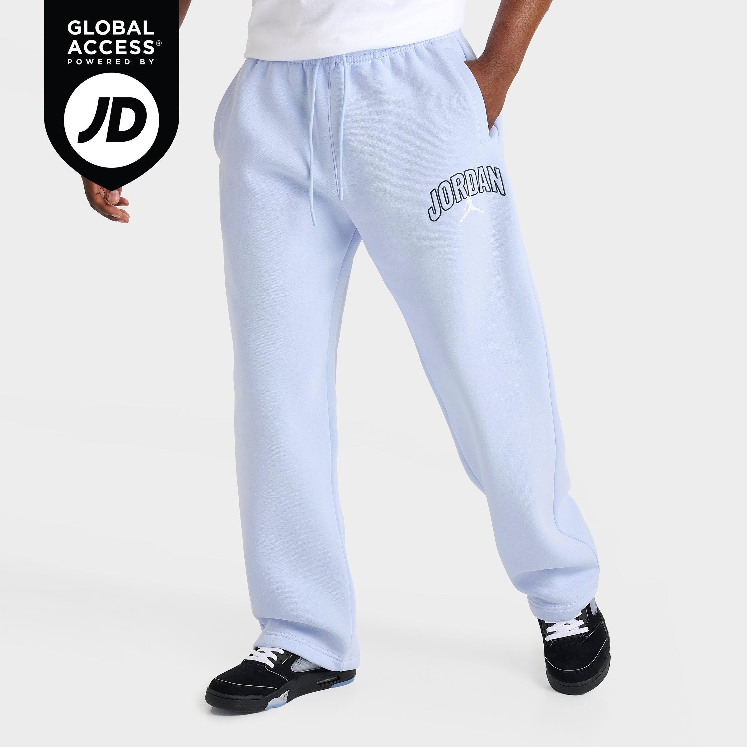 Jordan Men's Brooklyn Fleece Wordmark Logo Oversized Sweatpants in Hydrogen Blue/Sail Size: Medium