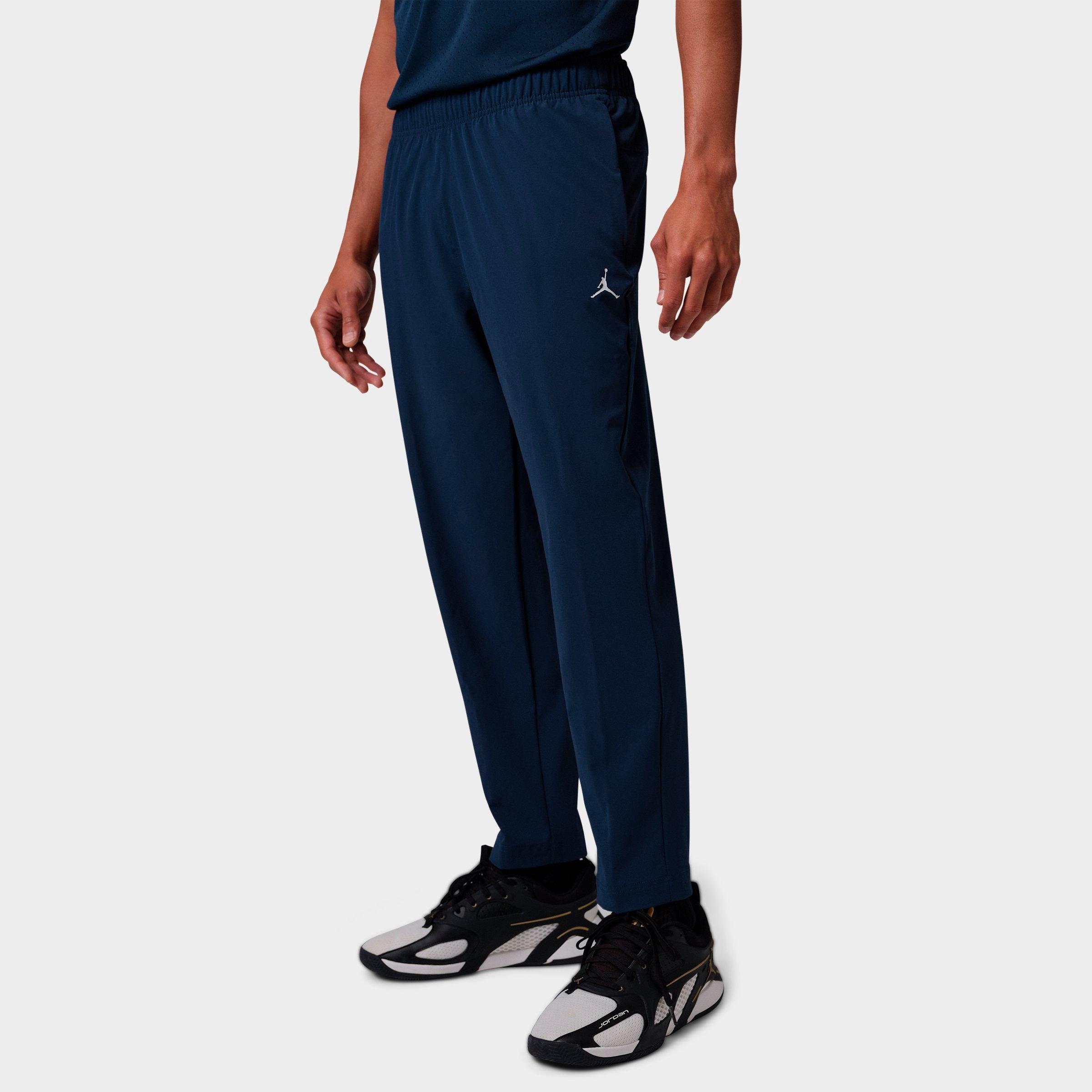 Jordan Men's Sport Essentials Dri-FIT Woven Pants in Midnight Navy Size: Medium