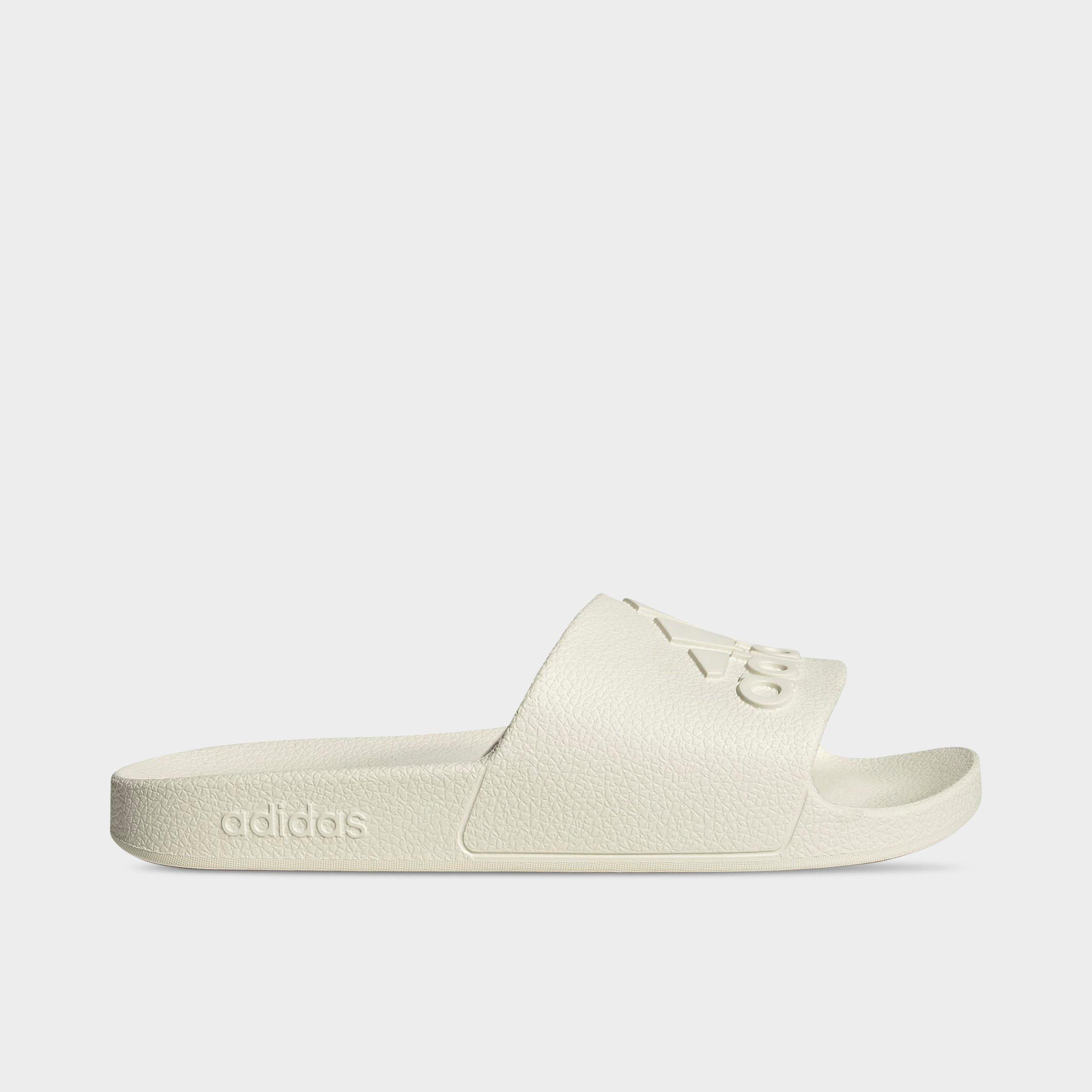 adidas adilette Aqua Slide Sandals in Off White/Off White Size: 5.0