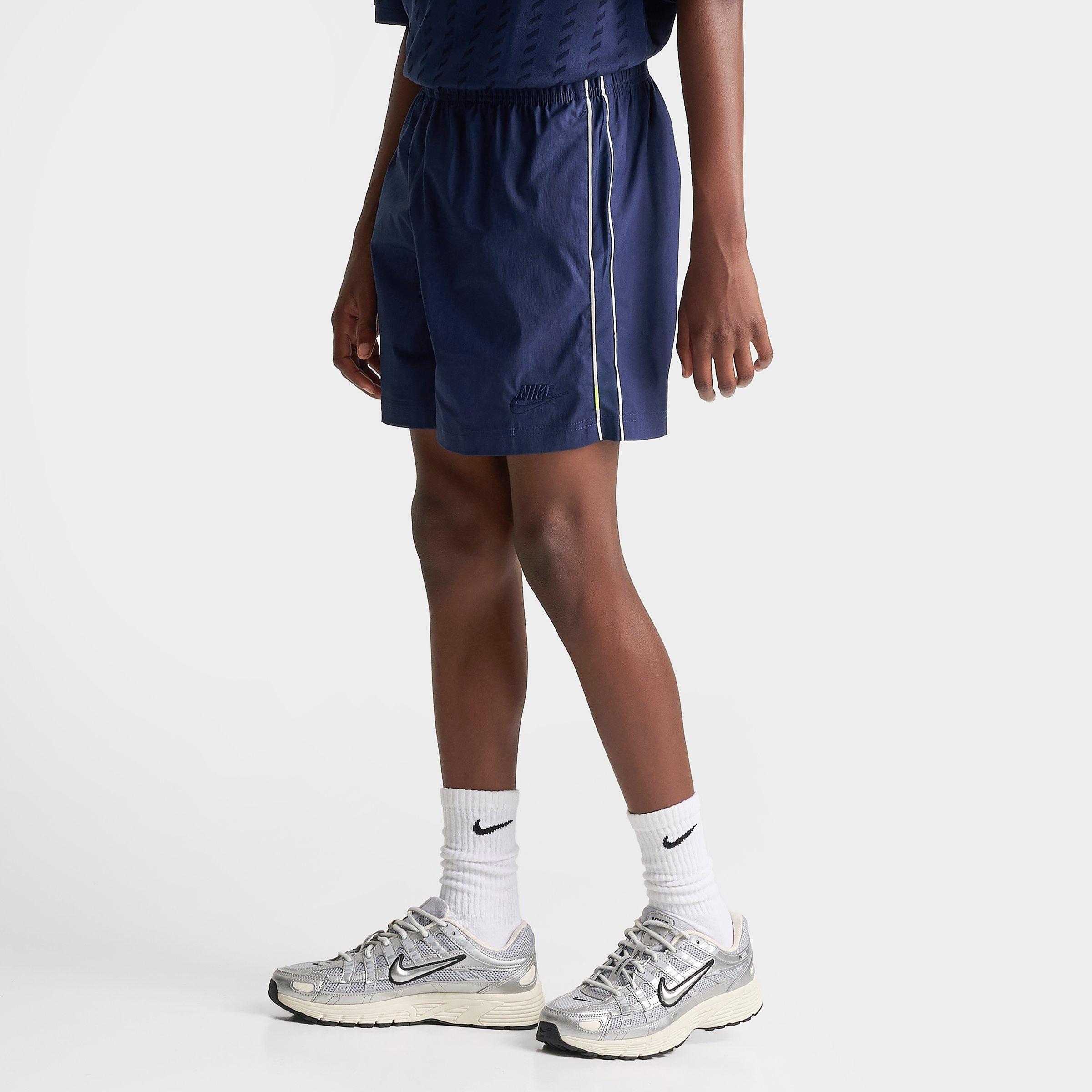 Nike Big Kids Sportswear Woven Shorts in Midnight Navy/Soft Pearl Size: Large