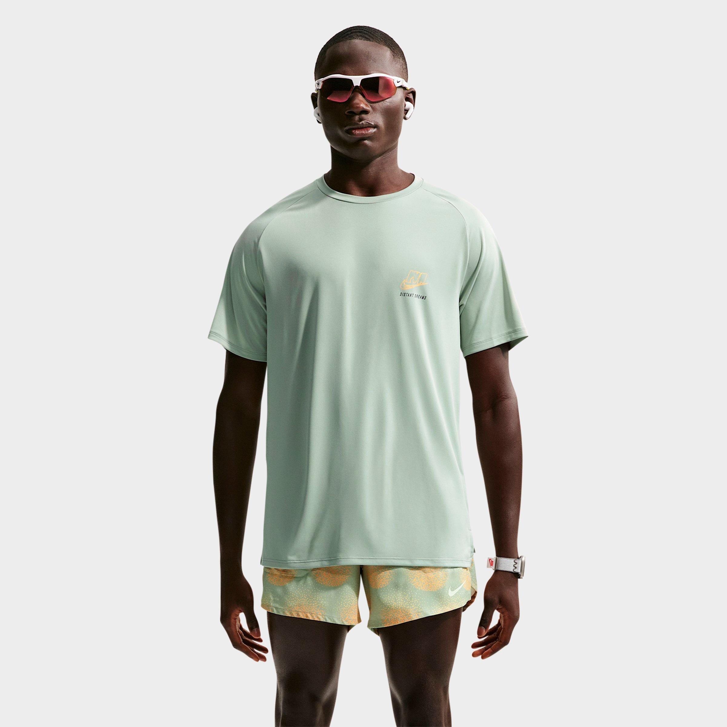 Nike Men's Stride Dri-FIT Distant Dreams ADV Running Top in Jade Horizon Size: Large
