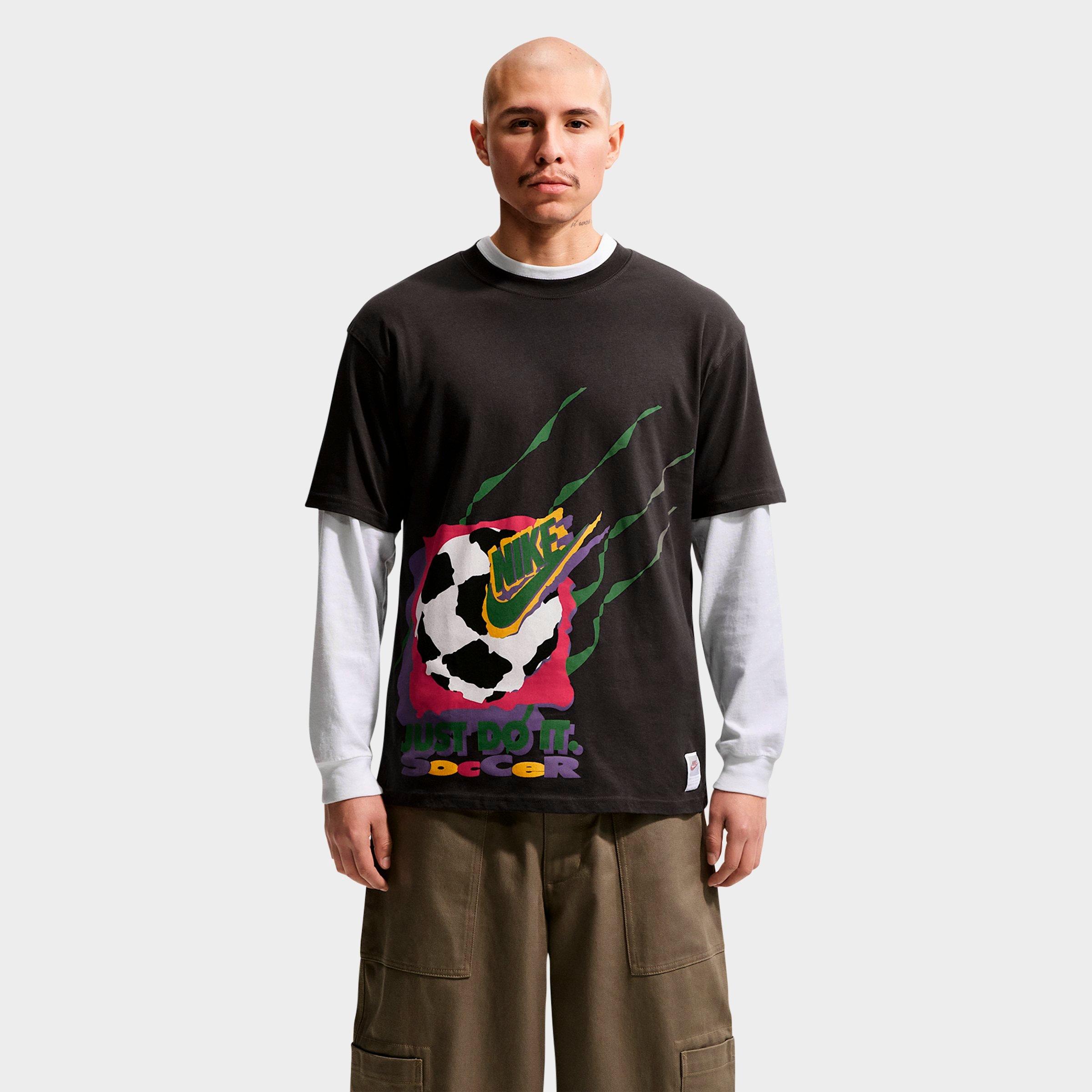 Nike Men's Sportswear Soccer DNA Retro Graphic T-Shirt in Off Noir Size: Small
