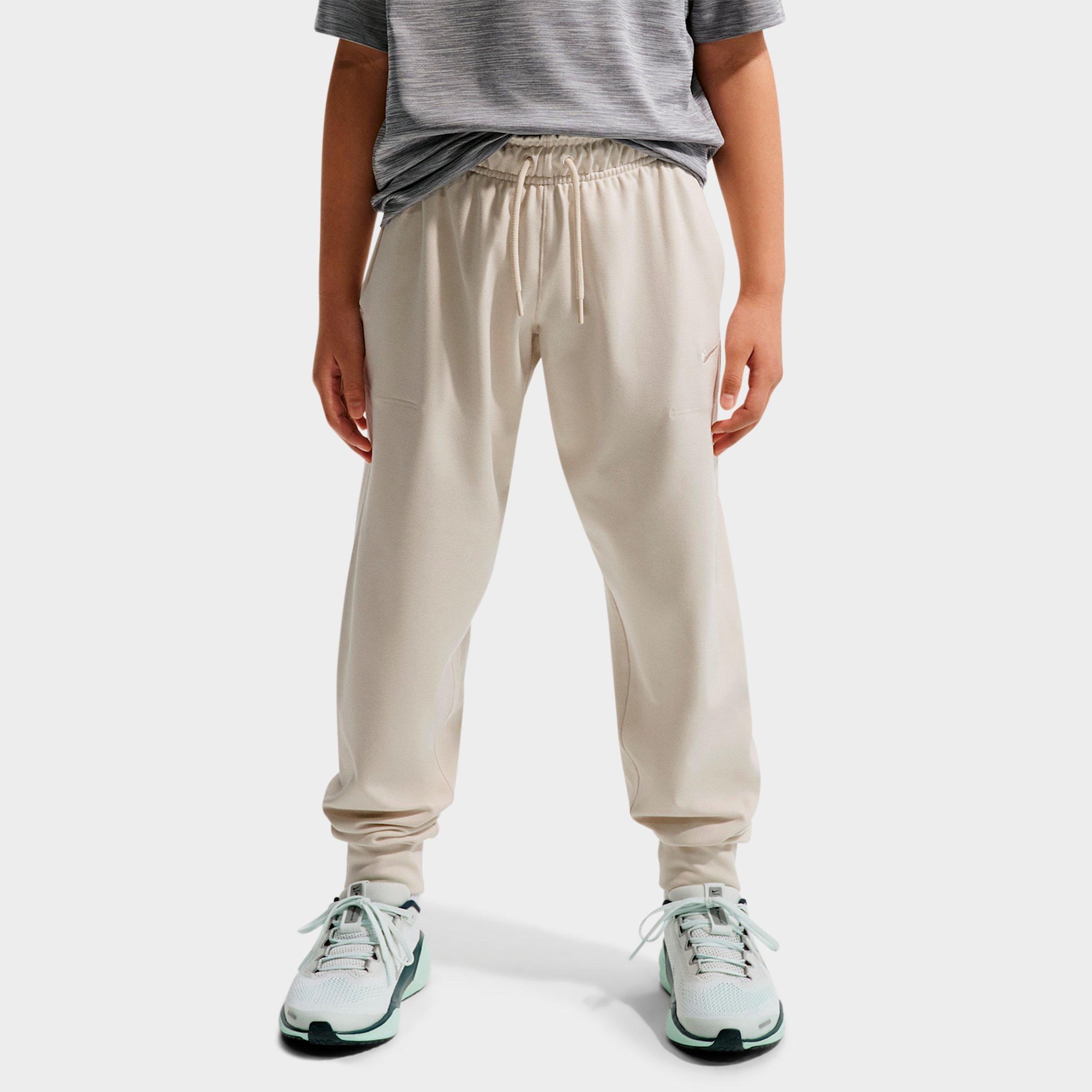 Nike Big Kids Primary Nanoknit Dri-FIT UV Protection Jogger Pants in Light Orewood Brown/Sail/Heather Size: Medium
