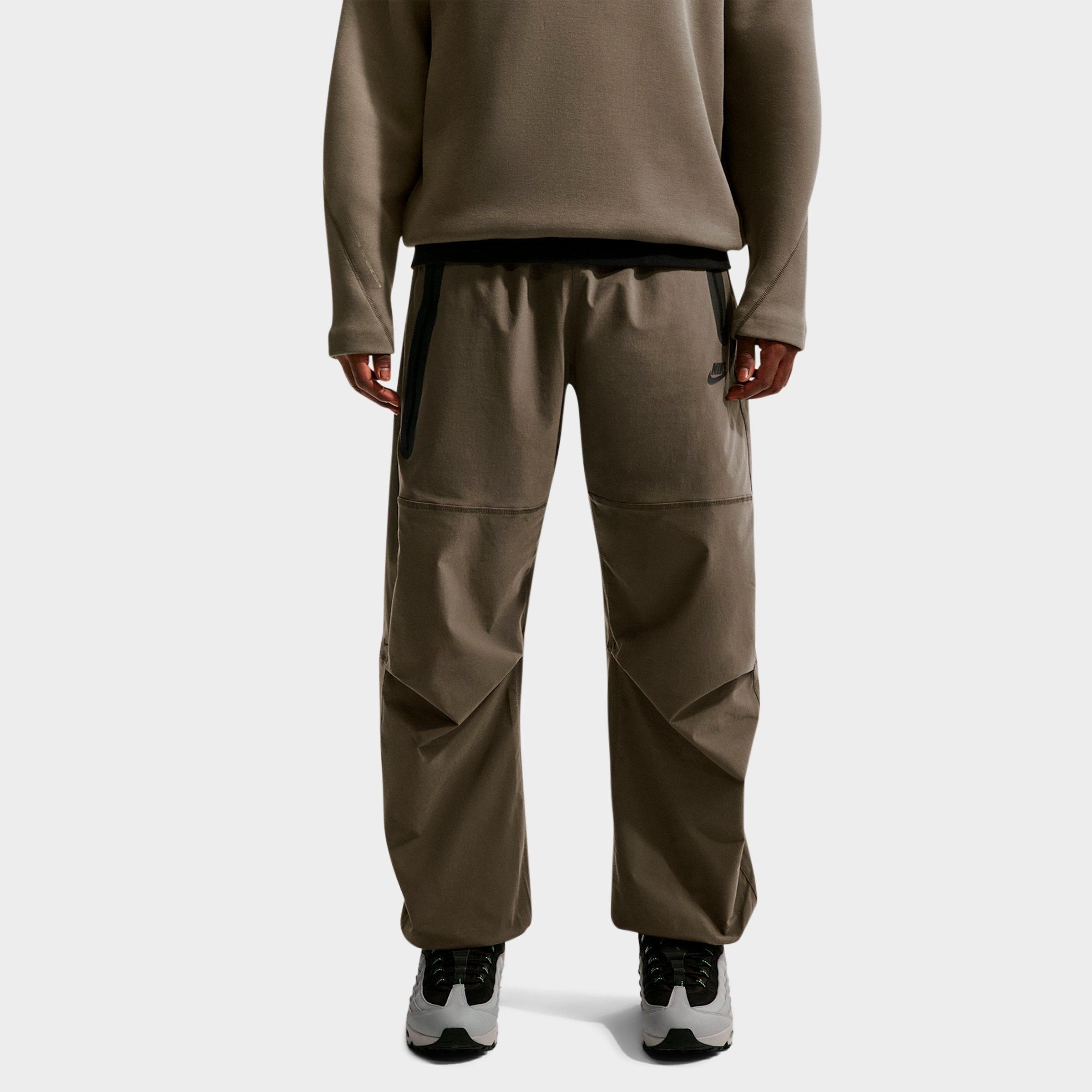Nike Men's Tech Dri-FIT Woven Pants in Dark Hazel/Dark Hazel/Black Size: Medium