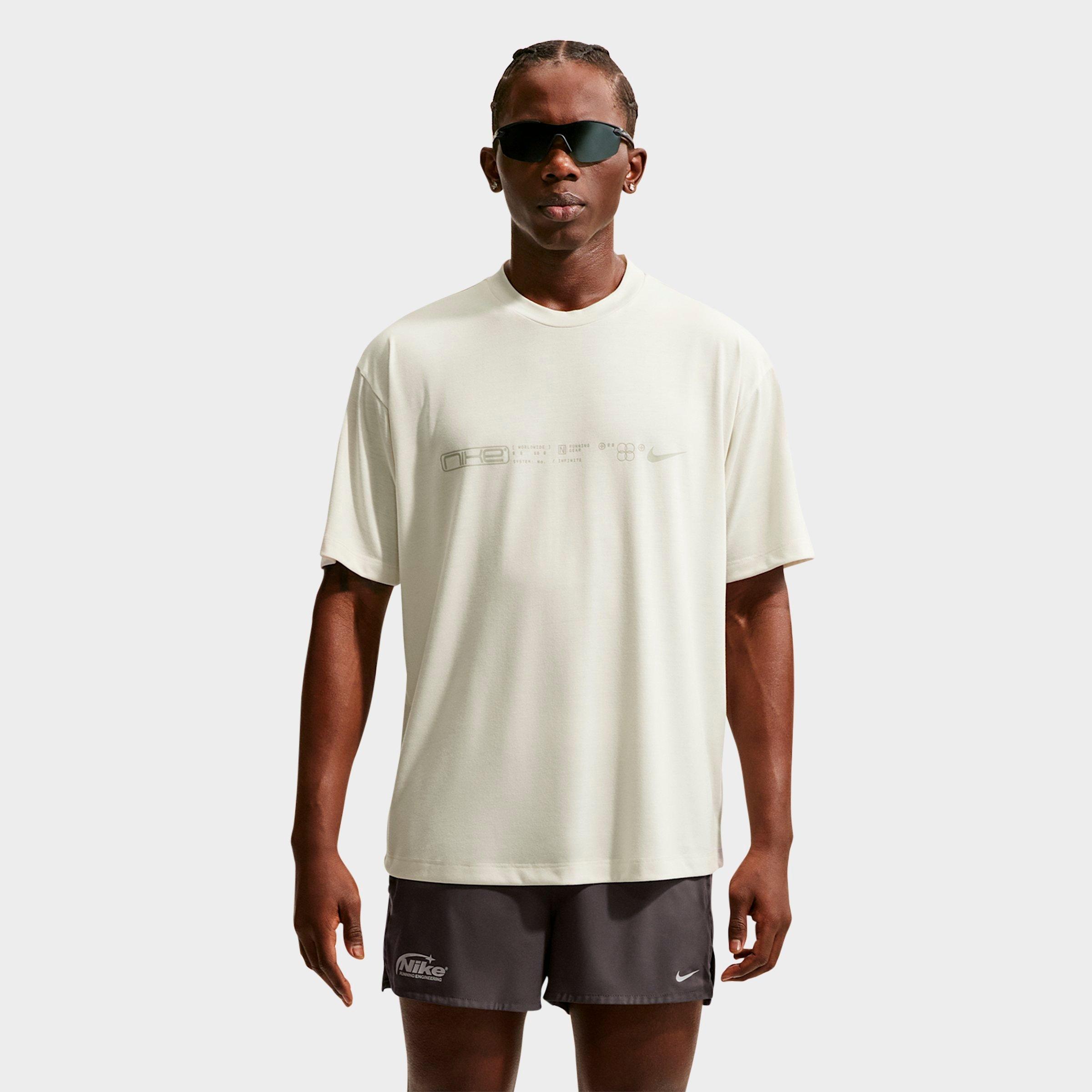 Nike Mens Disrupt Dri-FIT Short-Sleeve Running Top in Sea Glass/Saffron Quartz Size: XL