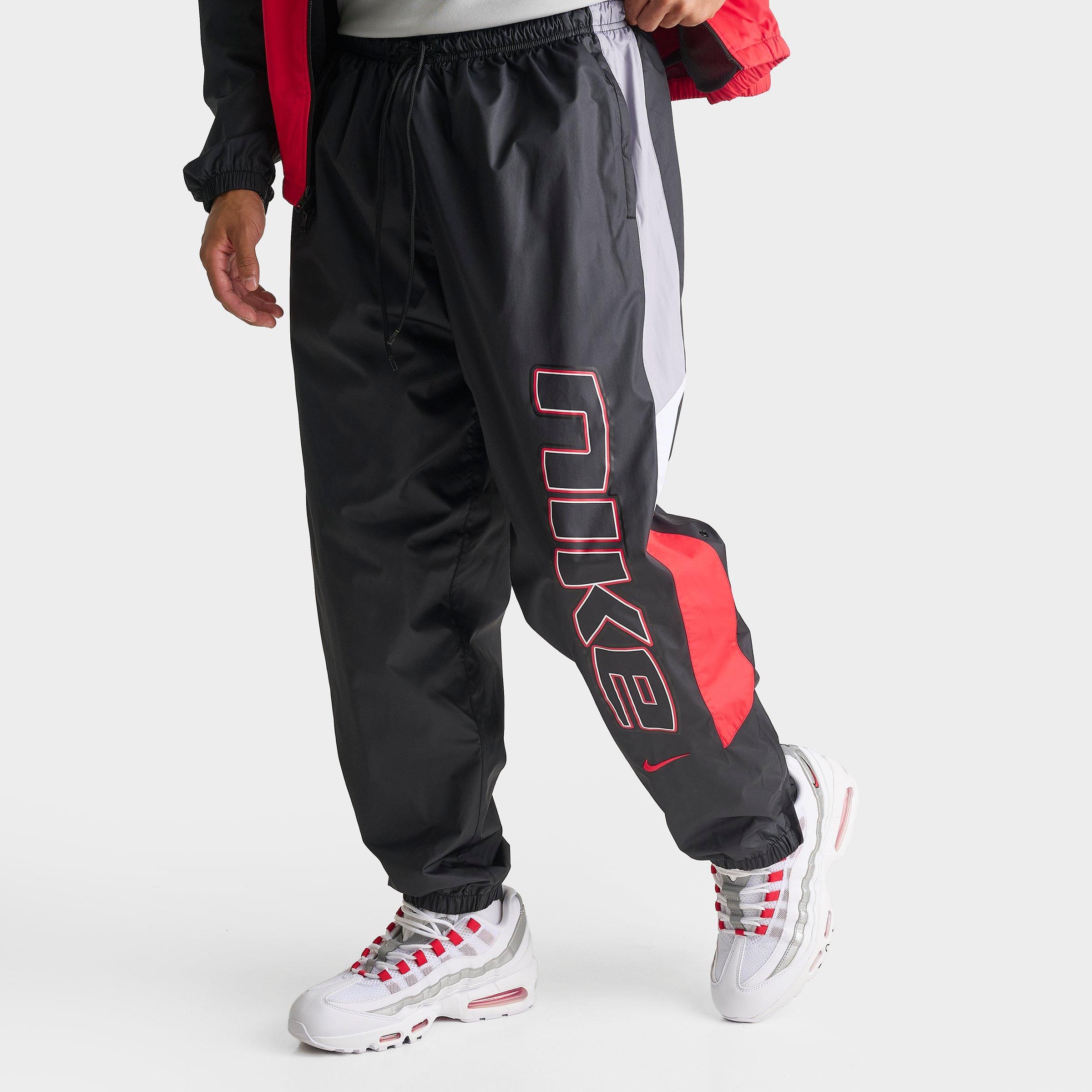 Nike Men's Sportswear Windrunner Lined Track Pants in Black/University Red/Cement Grey Size: 2XL