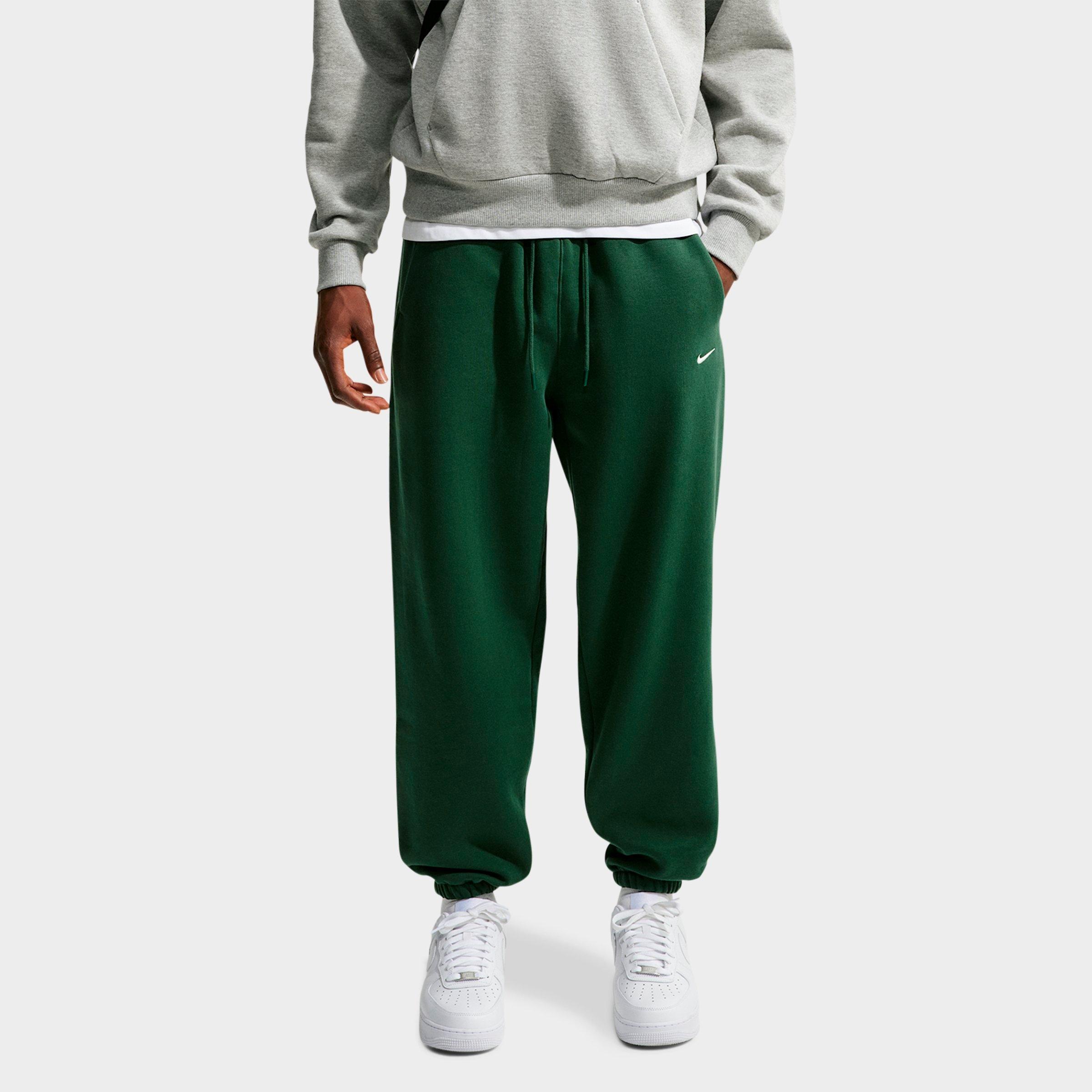Nike Men's Solo Swoosh Cuffed Sweatpants in Fir/Sail Size: Large