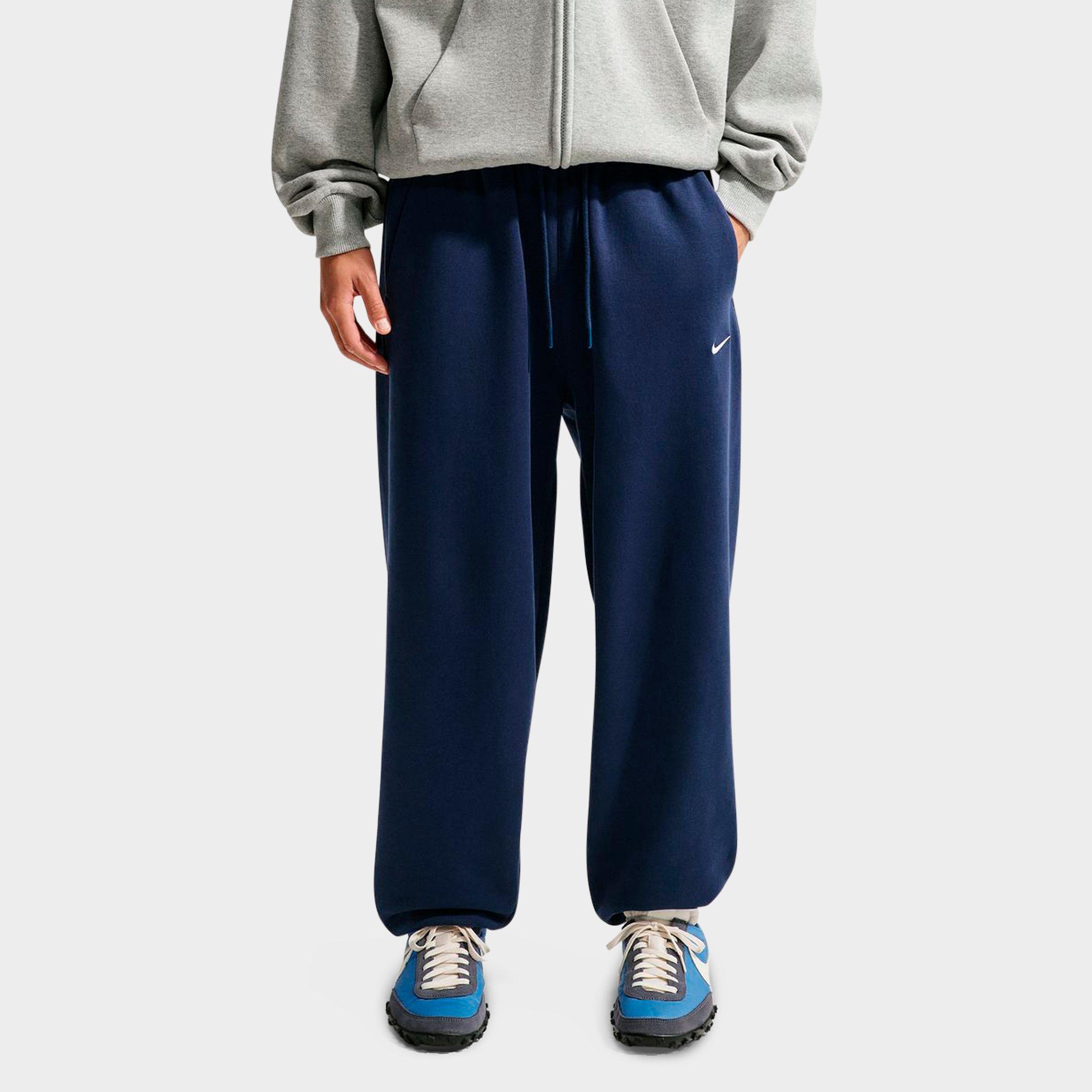 Nike Men's Solo Swoosh Cuffed Sweatpants in Midnight Navy/Sail Size: Small