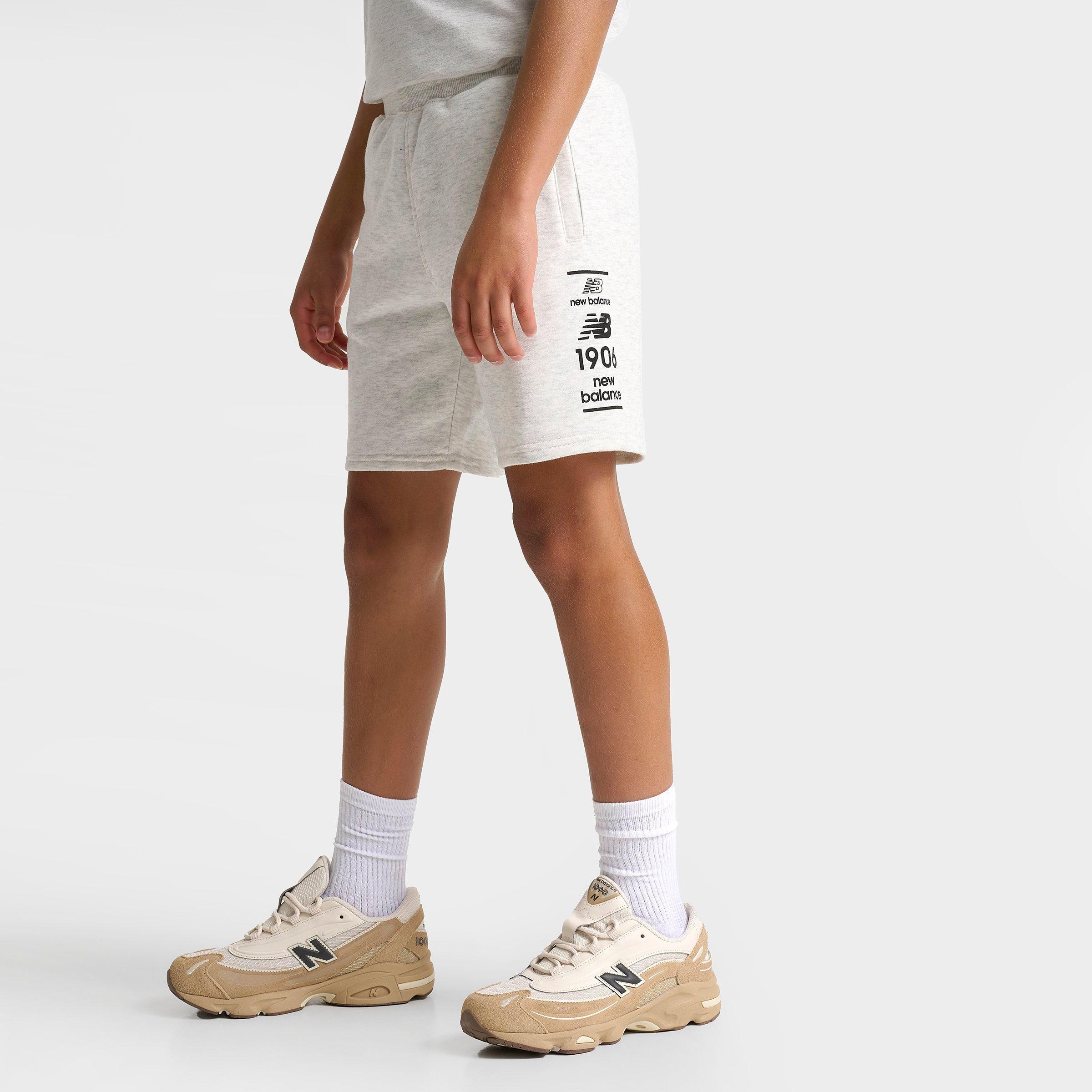 New Balance Kids Stacked Logo Fleece Shorts in Oatmeal Heather Size: Small