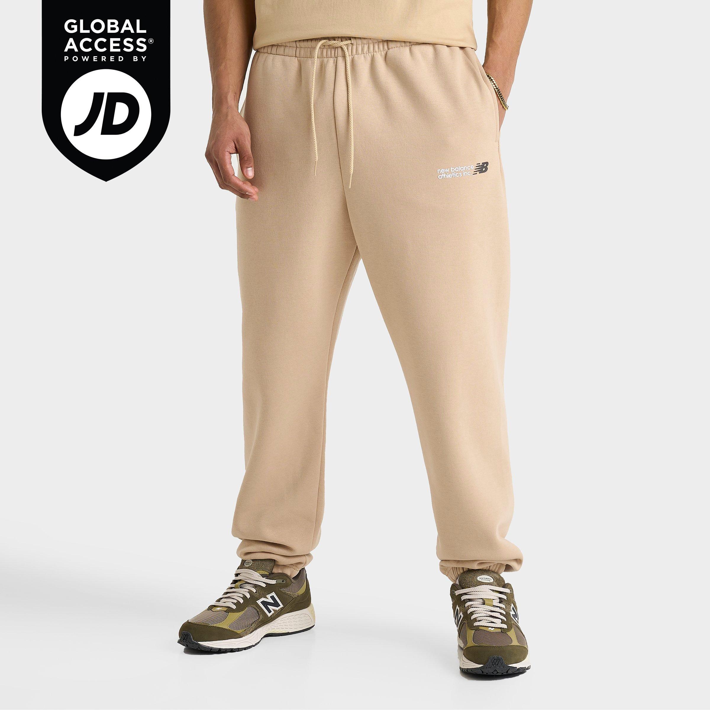 New Balance Men's Athletics Flying NB Logo Jogger Sweatpants in Incense Size: Small